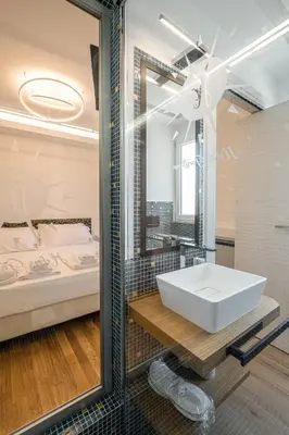 Letto o letti in una camera di Helios Guest House