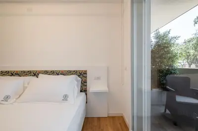 Letto o letti in una camera di Helios Guest House