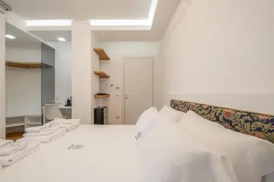 Letto o letti in una camera di Helios Guest House