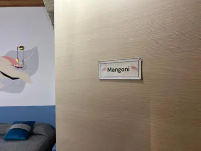 Certificato, attestato, insegna o altro documento esposto da Trigu & Mangoni