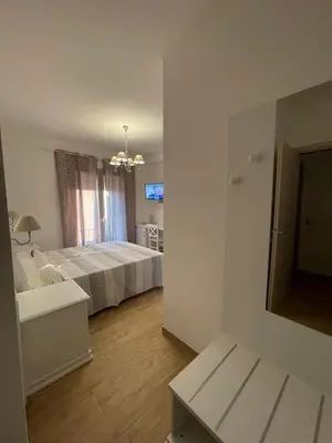 Letto o letti in una camera di Guest House Bellavista Nebida