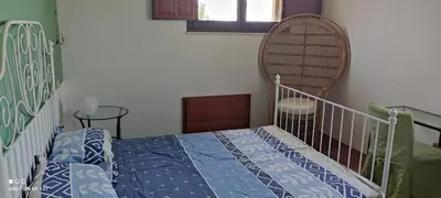 Letto o letti in una camera di Villa M. Rosso