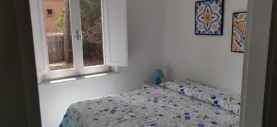 Letto o letti in una camera di Villetta in stile mediterraneo