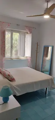 Letto o letti in una camera di Villetta in stile mediterraneo