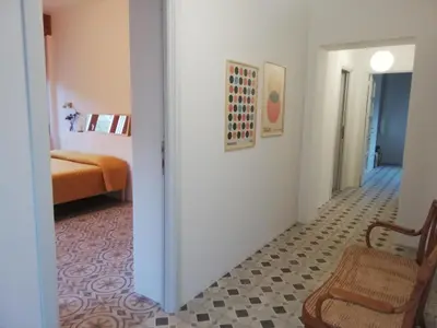 Letto o letti in una camera di B&B San Gregorio SINNAI