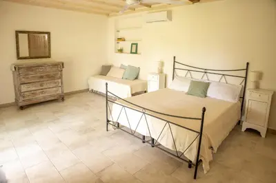 Letto o letti in una camera di Il Casale