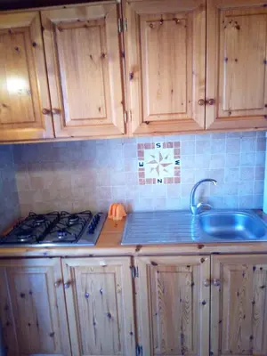 Cucina o angolo cottura di La spiaggetta Maladroxia BIANCA