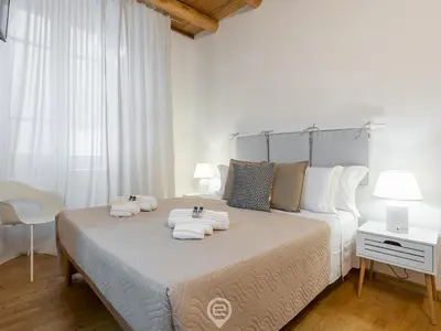 Letto o letti in una camera di Estay Stampace