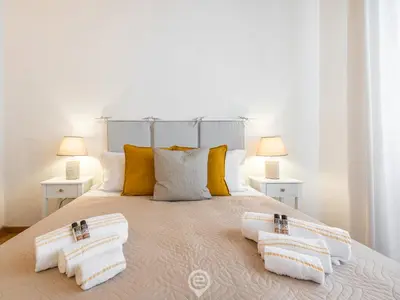 Letto o letti in una camera di Estay Stampace