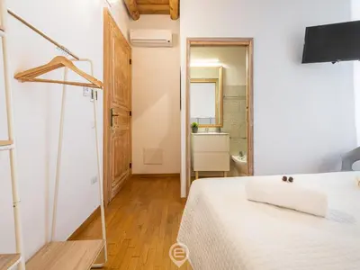 Letto o letti in una camera di Estay Stampace