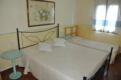 Letto o letti in una camera di Villa di Marco