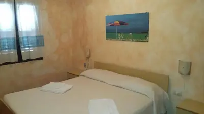 Letto o letti in una camera di Villa di Marco