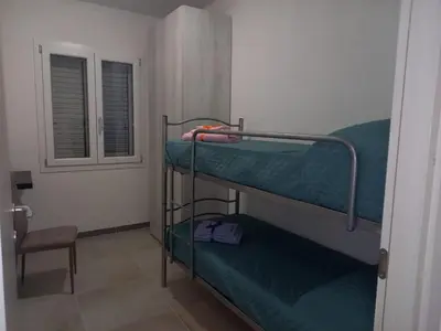 Letto o letti in una camera di La casa di Isa