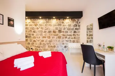 Letto o letti in una camera di Affittacamere Casa Concia