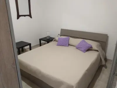 Letto o letti in una camera di Da Carla