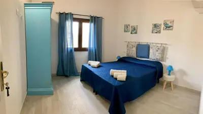 Letto o letti in una camera di PRIMA LUCE