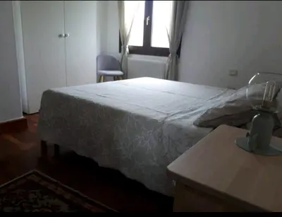 Letto o letti in una camera di Villa degli Ulivi