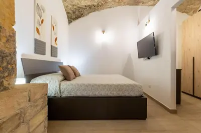 Letto o letti in una camera di Casa Vacanza Home MAF