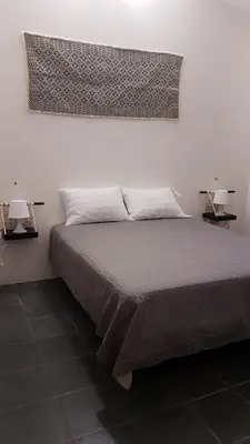 Letto o letti in una camera di Casa Margherita