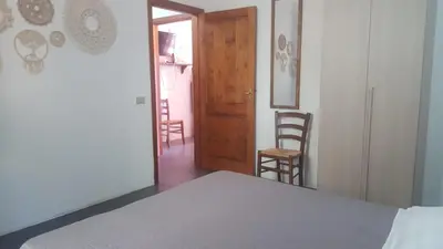 Letto o letti in una camera di Casa Margherita