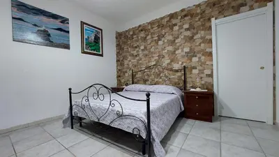 Letto o letti in una camera di Il Lentischio