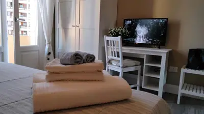 Letto o letti in una camera di MomHouse - Appartamento - cagliari