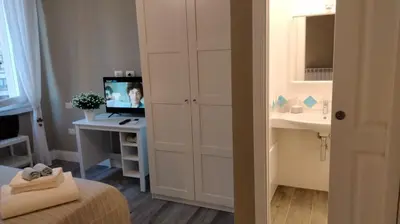 Letto o letti in una camera di MomHouse - Appartamento - cagliari