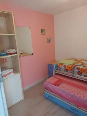 Letto o letti in una camera di Paraiso S
