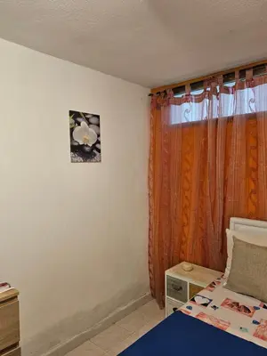 Letto o letti in una camera di Paraiso S