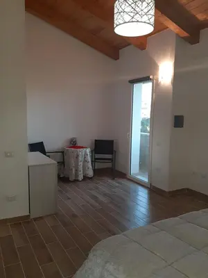 Letto o letti in una camera di B&b nonna dedda