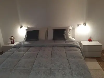 Letto o letti in una camera di B&b nonna dedda