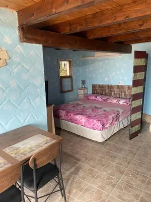 Letto o letti in una camera di Mini Ottema