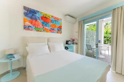 Letto o letti in una camera di Oasi Blu Sardinia