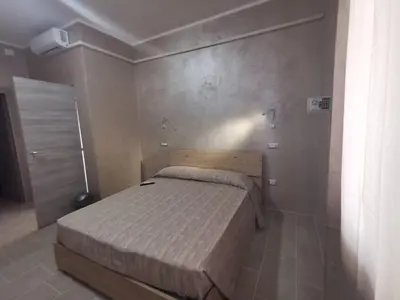 Letto o letti in una camera di Villa Bianca