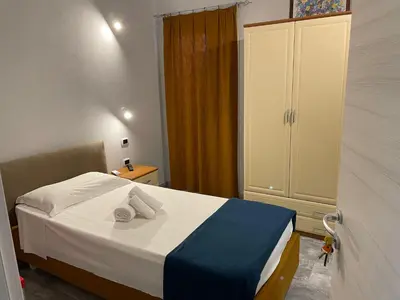 Letto o letti in una camera di Casa Camere Pistis