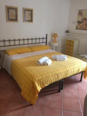 Letto o letti in una camera di Villa Franca