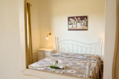 Letto o letti in una camera di Villetta Saeprus