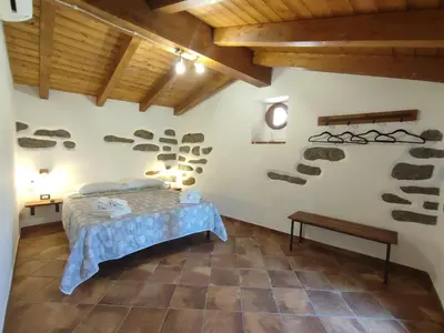 Letto o letti in una camera di La Corte Dei Baroni