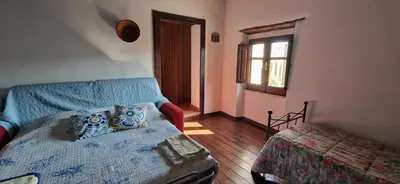 Letto o letti in una camera di Domus de Jara - Casa Montis