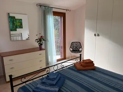 Letto o letti in una camera di Villa Magnolia