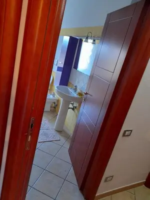 Bagno di Casa Corallo Muravera Appartamento Centralissimo due camere letto cucina e soggiorno nuovo letto matrimoniale e singoli Aria condizionata Parcheggio interno Coperto ideale x 2 o 3 moto