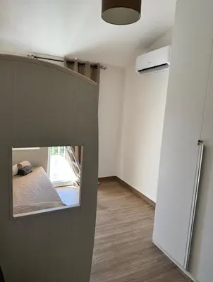 Letto o letti in una camera di Pula Residence - Via Delle Rose
