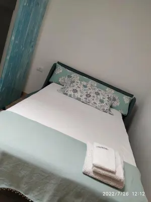 Letto o letti in una camera di B&B SA CROBE