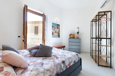Letto o letti in una camera di Antonia Suite