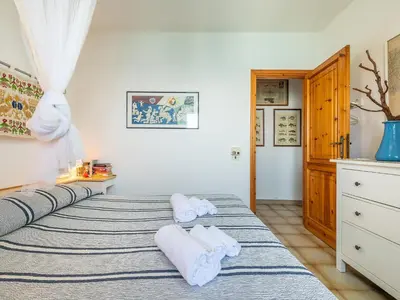 Letto o letti in una camera di CASA FLAMINIO