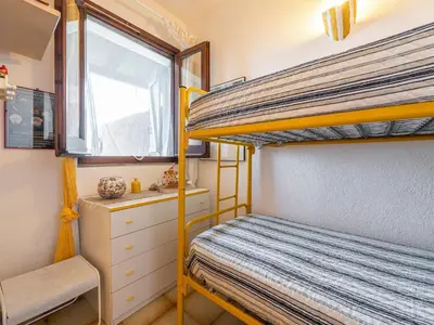 Letto o letti in una camera di CASA FLAMINIO