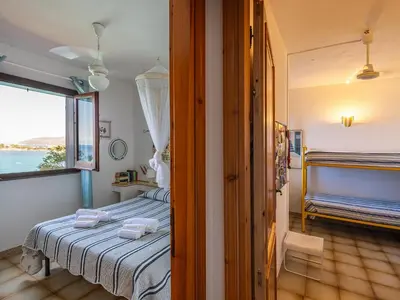 Letto o letti in una camera di CASA FLAMINIO