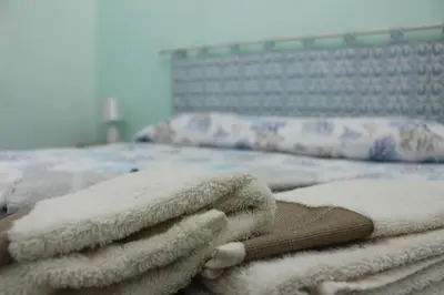 Letto o letti in una camera di Casa Vacanze Nonna Franca