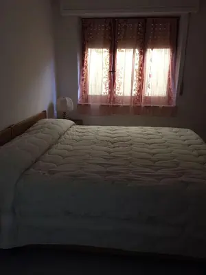 Letto o letti in una camera di B&B ANNA