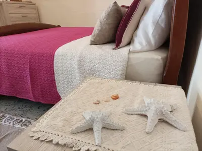 Letto o letti in una camera di Appartamento Oliver Villasimius
